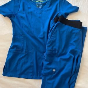 Royal blue scrubs, Healing Hands brand. Size M. Worn once. Includes 2nd set